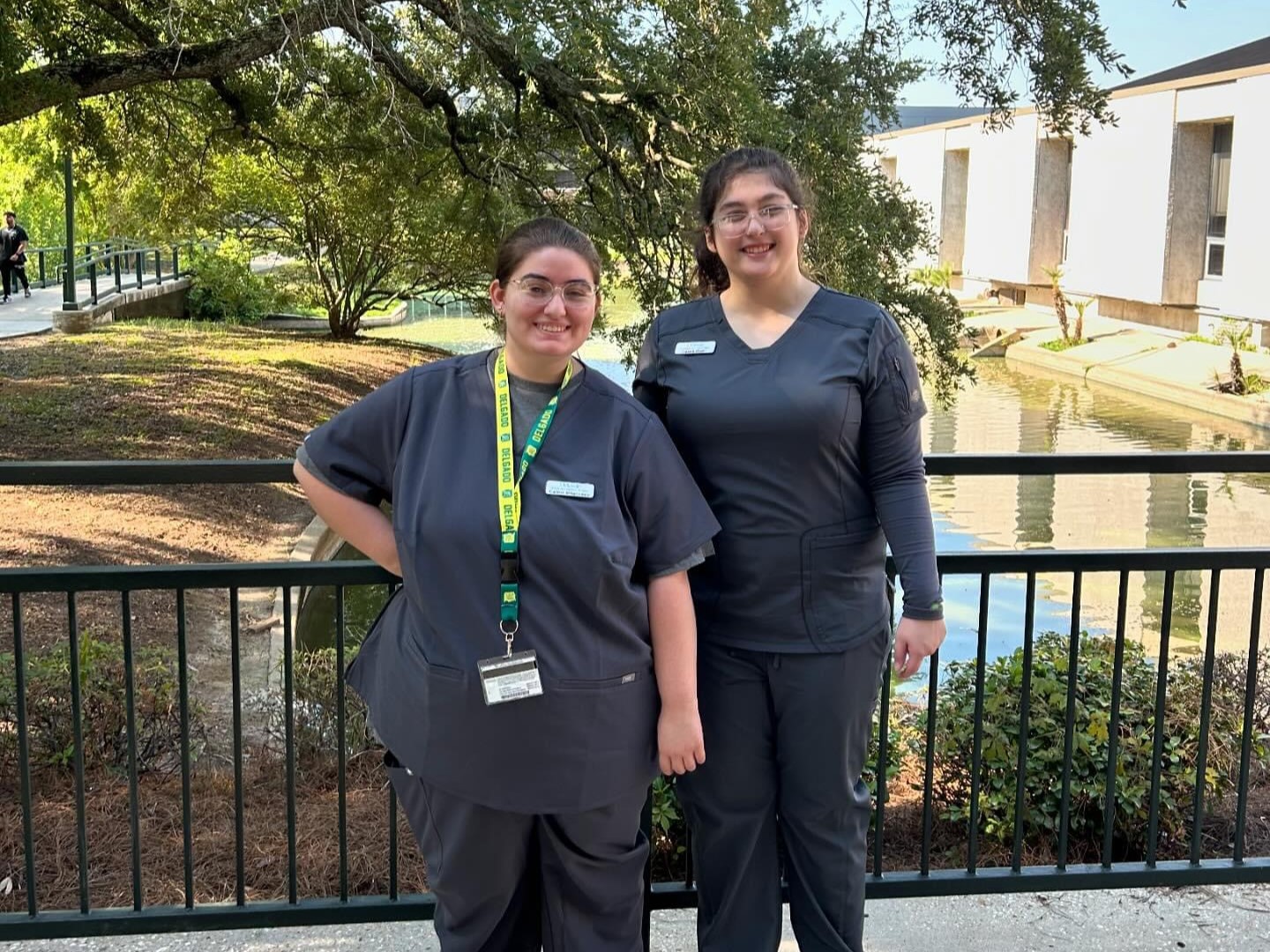 Delgado students wear scrubs on campus.