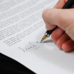 Hand Signing Legal Document with Stylus