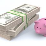 Savings Accounts: Hundred-Dollar Bills and Pink Piggy Bank