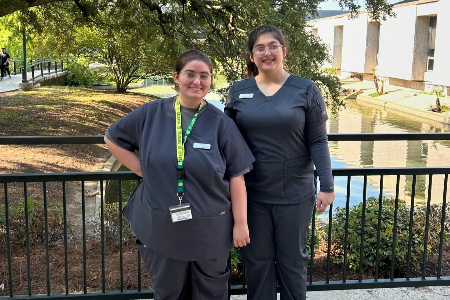 PAYCheck students wear vet scrubs on campus